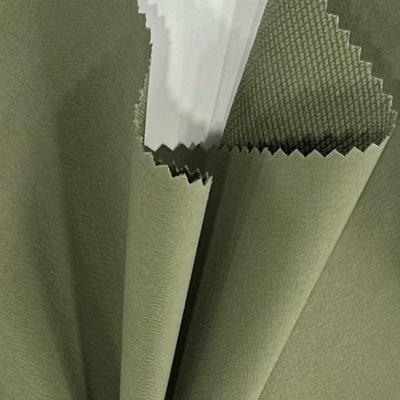 China Double Chain Interlock Polyester Fabric Four Way Stretch For Jacket / Suit / Sportswear for sale