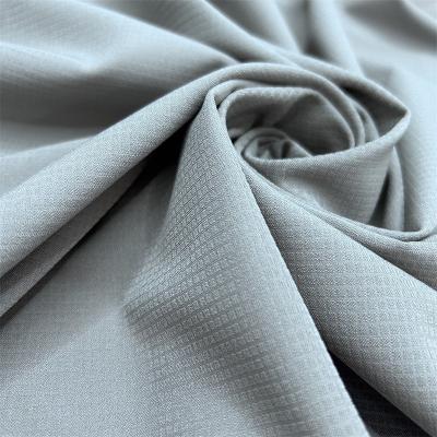 China Waffle Four Side Elastic 75D+40D*100D+40D Soft Handfeel Fabric for sale