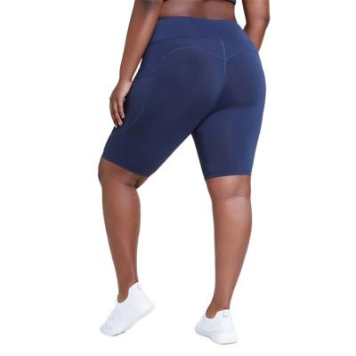 China Breathable Large Size Tummy Control High Rise Butt Lifting Deportes Leggings With Pockets Big Size Women Sportswear Yoga Short Leggings for sale