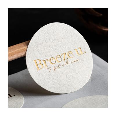 China Waterproof Custom Round Bronzing Florist LOGO Embossed Custom Printing Gold Foil Stickers for sale