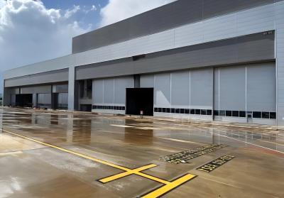 Chine Hangar de structure en acier personnalisable pour des solutions de stockage flexibles et des avions à vendre