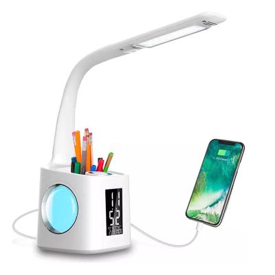 China Industrial Custom Mesh Pen Holder Metal Table Lamp Smart Desk Clock with Pen Holder Study LED Wireless Portable Modern Pen Holder Tablelamp for sale