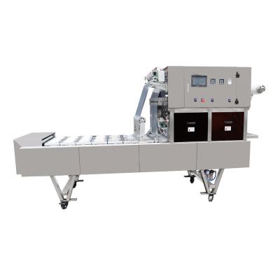 China High Efficiency Cake Cup Sealing Machine Energy Saving Food Tray Box Sealer for sale