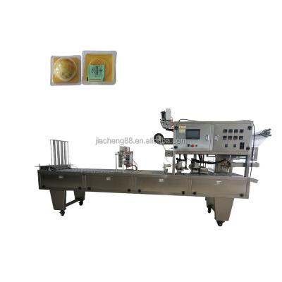 China Automatic Professional Food Mooncake Maker Pineapple Cake Making Machine Seal Topping Machine for sale