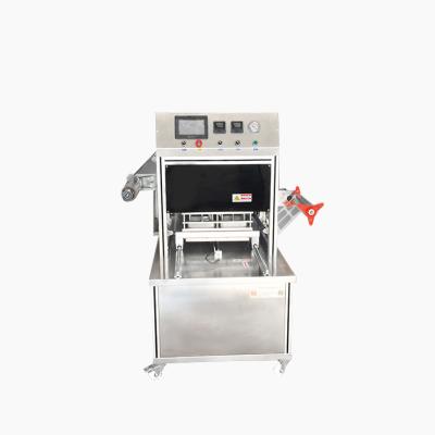 China Good Price Automatic Vacuum Tray Sealer Food Box Packing Machine Pig Skin Meat Pig Vacuum Packing Machine for sale