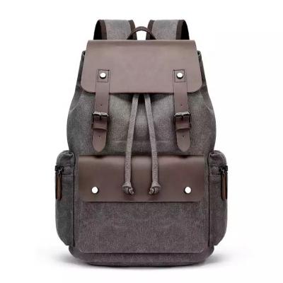 China Waterproof outdoor travel backpack Canvas men's and women's universal backpack splicing leather mountaineering backpack for sale