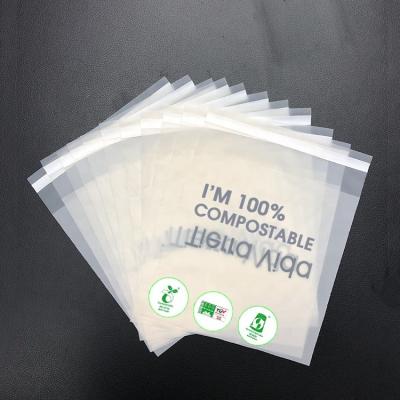 China 100% Compostable Cornstarch Biodegradable Biodegradable Bags 100% PLA Garment Packaging With Self Adhesive Tap for sale