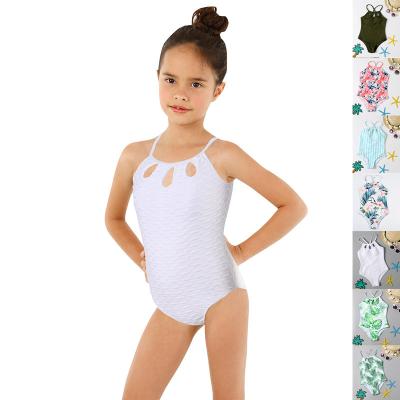 China Antibacterial Hot Selling Girl Swimwear Adjustable Strap Bust Kids Beachwear Solid Nylon Hollow Halter Lace Up Protective Child Removable Swimsuit for sale