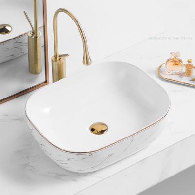 China Luxury Rectangle No Hole Ceramic Color Art Hotel Custom Vessel Sink Table Tops Gray Gold Basin for sale