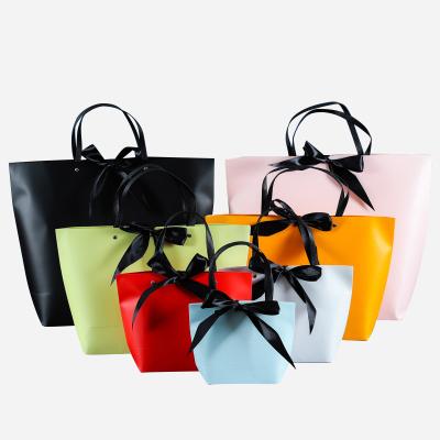 China Eco-friendly Colorful Luxury Ribbon Handles Wedding Jewelry Gift Packaging Custom Printed Shopping Paper Bags With Your Own Logo for sale