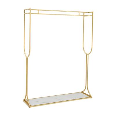 China Retail store decoration gold metal boutique clothing shelf boutique commercial dresses show store wedding rack for dress display for sale