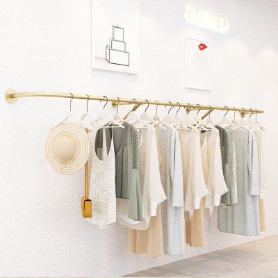 China Gold Wall Mounted Clothing Store Boutique Hanger Racks Luxury Chrome Pipe Plating Clothes Wall Ceiling Clothing Rack For Store for sale