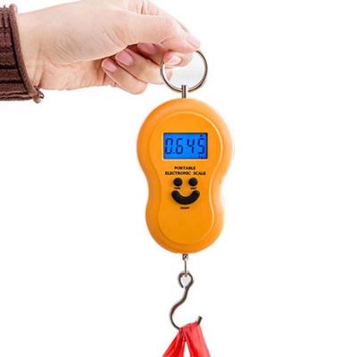 China Household Wighting Scales Portable Foldable Travel Luggage Scale 50kg Digital Hanging Weighing Scale for sale