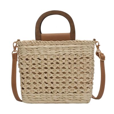 China Lady's Autumn And Winter Series Small Girls Knitting Shoulder Bag Crossbody Woven Beach Rattan Straw Bag for sale