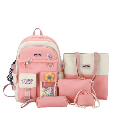 China Waterproof Spring 2022 Wholesale Kawaii Bag Fashion Nylon Waterproof School Bags For Teenagers Girls With Rabbit Pendant for sale