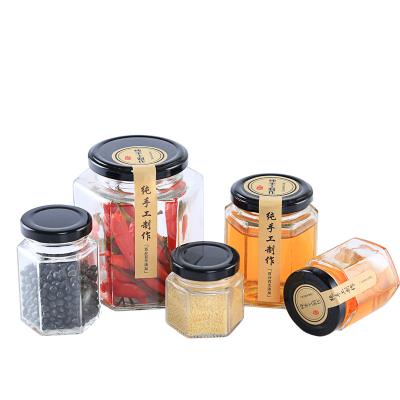 China Wide Mouth Food Grade Hexagonal Food Grade Storage Jar Glass Honey Jar for sale