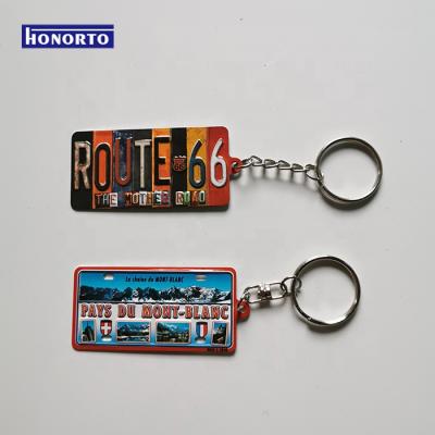 China Custom Wholesale Decoration Hot Sale OEM Souvenir Embossed 3D Metal License Plate Aluminum Key Chain for sale