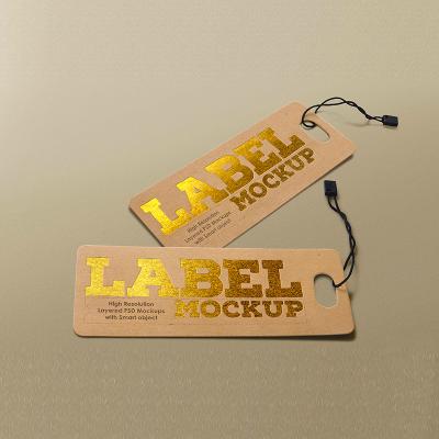 China Sustainable Wholesale Custom Guangdong Kraft Paper Labels String Jeans Digital Printed Hang Tag With Gold Foil Stamping for sale