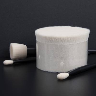 China Super Soft Plastic Conical High Powder Absorption And Release Wool Hair Filament For Make Up Brushes for sale