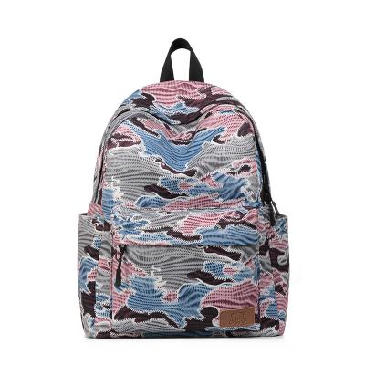 China Waterproof fashionable printed retro backpacks girl daypack lightweight university students school backpacks for sale