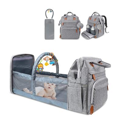 China With USB Diaper Backpack With Folding Hutch Diapers Changing Station Mommy Bag Backpack With Sunshade Mosquito Net Foldable Crib for sale