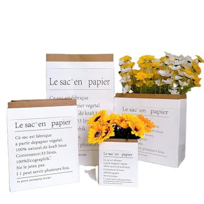 Chine Sac en papier d'emballage de cadeau sur mesure Sac en papier d'emballage de fleurs à vendre