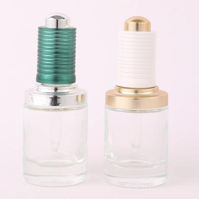 China Custom Logo Green Clear Gold 30ml Glass Serum Bottle White Dropper Bottle for sale