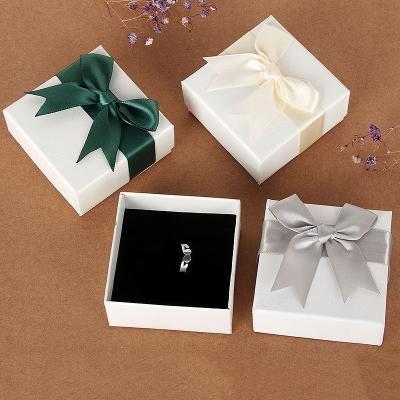 China 8*8*1.7cm Jewelry Packaging Boxes Base Lip Boxes With Ribbon for sale