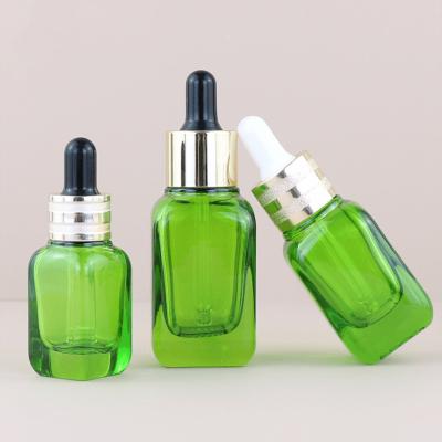 China 15ml 30ml 50ml Unique Green Square Glass Bottle Cosmetic Oil Glass Dropper Bottles Sealing Type Dropper Industrial Cosmetic for sale