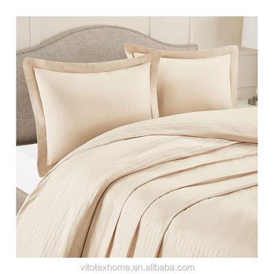 China Disposable Solid Color Cream Duvet Cover And Sham Set Soft Washed Microfiber Embossed Stripes 3 Pcs Set for sale