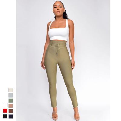 China Custom high quality sexy stylish long pencil bodycon breathable pierced high waist solid color casual bandage pants for sale