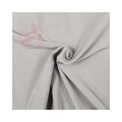 China Hot Selling 130gsm 100D Spandex Polyester 4 Way Stretch Fabric Plain Weave Fabric EMX3464 for sale