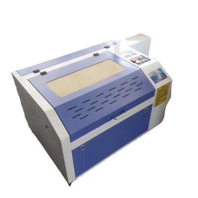 China Desktop Laser Cutter CO2 Laser Engraver Engraving Cutting Machine 2030 4060mm with Rotary Axis 3D Laser Engraving Machine for sale