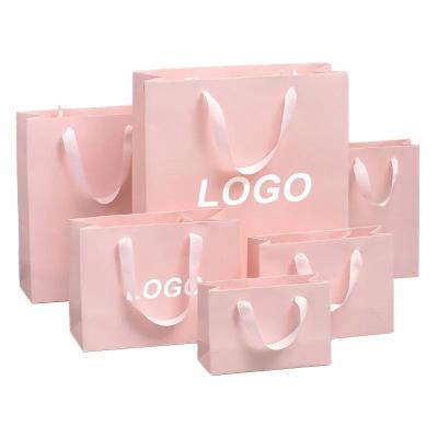 China Customised Cloth Boutique Cardboard Packaging Brand Matte Cheap Pink Gift Paper Bag with Your Own Logo For Small Business for sale