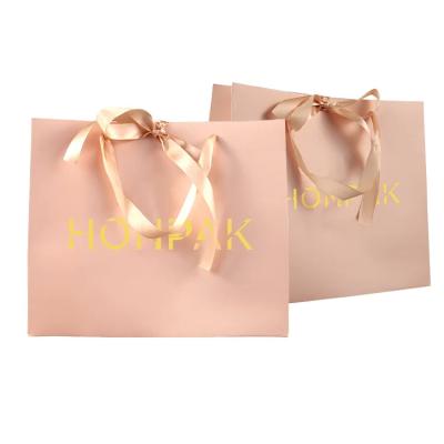 China Custom logo shopping thank you luxury small gift paper bags for jewelry cosmetic packaging for sale