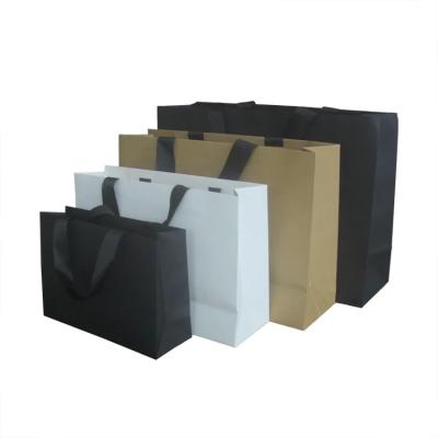 China HONPAK black shopping paper bag bolsas de papel de regalo negra de lujo logotipo sacoche carton sac papier logo for sale