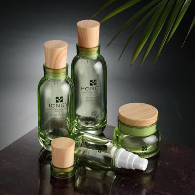 China New Style Personal Care Beautiful Round Cosmetic Lotion Pump Spray Bottle And Cream Glass Jar for sale