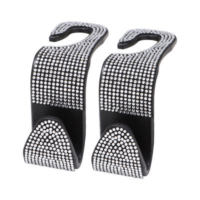 China Automatic Bling Bling Crystal Rhinestone Car Headrest Hook Bling Seat Diamond Holder Hangers for sale