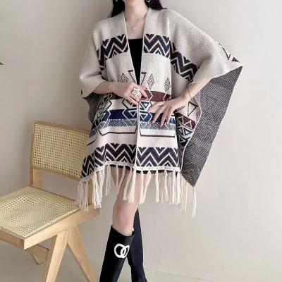 China High Quality 2023 New Design Fringe Poncho Shawl Coat For Women Loose Knitting Tassel Cape for sale