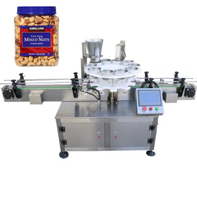 China Multifunctional Food Factory Price Nuts Filling Machine Cashew Tin Packing Machine for sale