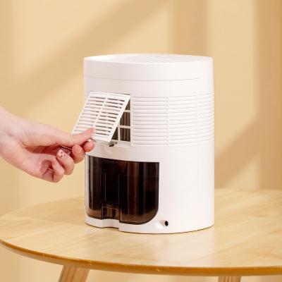 China New Household Indoor Small Home Dehydration Drying Dehumidifier For Bedroom With Air Purifier Home for sale