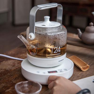 China 360 Degree Spinning High Borosilicate Cordless Water Jug Low Glass Electric Tea Kettle With Infuser for sale