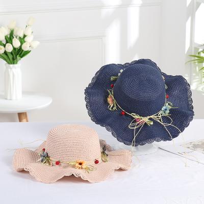 China Foldable And Easy To Wear Summer Flower Outdoor Decoration Fashion Straw Sun Beach Hat Folding Wholesale for sale