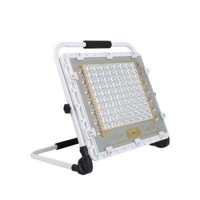 China Outdoor Warehouse High Efficiency Camping Emergency Light USB Charging 1400W LED Solar Flood Light for sale