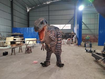 China Realistisch volwassen echte dinosaurus pak Jurassic World Realistisch wandelend dinosaurus kostuum Te koop