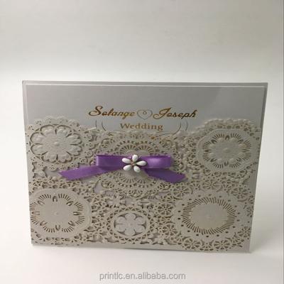 China Africa Engrave Pattern Laser Cut Wedding Card With Ribbon And Stone Decoration for sale