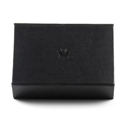 China Handmade Reputable Black Flat Folding Packing Cardboard Hardback Book Form Magnetic Closure Gift Box With Debossed Butterfly Logo for sale