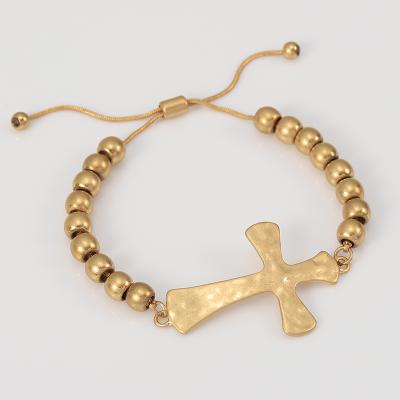 China Fashion environmental friendly European and American metal plated old gold cross stretch adjustable hot selling bracelet for sale