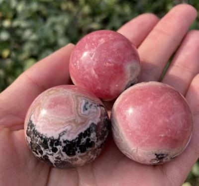 China China High Quality Natural Rhodochrosite Sphere Healing Rhodonite Crystal Ball for sale