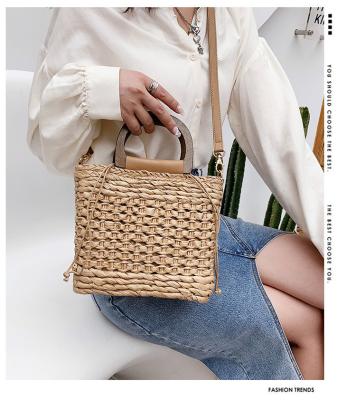 China Tiktok 2022 New PORTABLE Summer Fashion Beach Straw Bag Cavity Contracted Worn Shoulder Bag Female Bag for sale